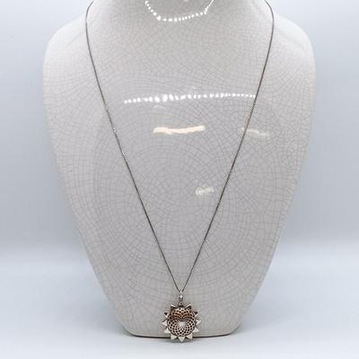 LOT 39: Sterling Silver Collection - Frog Pendant with Gemstones, Sun Shaped Perfume Pendant, Textured Braid Ring & More