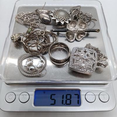 LOT 39: Sterling Silver Collection - Frog Pendant with Gemstones, Sun Shaped Perfume Pendant, Textured Braid Ring & More