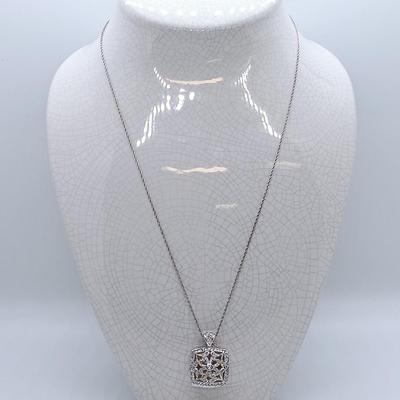 LOT 39: Sterling Silver Collection - Frog Pendant with Gemstones, Sun Shaped Perfume Pendant, Textured Braid Ring & More