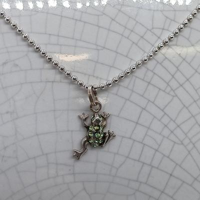 LOT 39: Sterling Silver Collection - Frog Pendant with Gemstones, Sun Shaped Perfume Pendant, Textured Braid Ring & More