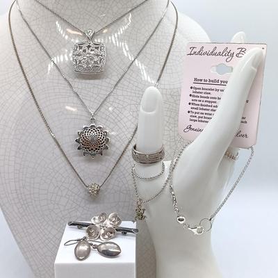 LOT 39: Sterling Silver Collection - Frog Pendant with Gemstones, Sun Shaped Perfume Pendant, Textured Braid Ring & More