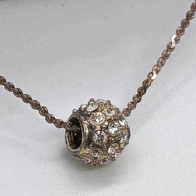 LOT 39: Sterling Silver Collection - Frog Pendant with Gemstones, Sun Shaped Perfume Pendant, Textured Braid Ring & More