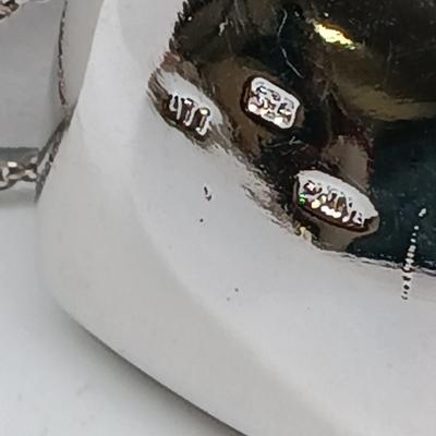 LOT 39: Sterling Silver Collection - Frog Pendant with Gemstones, Sun Shaped Perfume Pendant, Textured Braid Ring & More