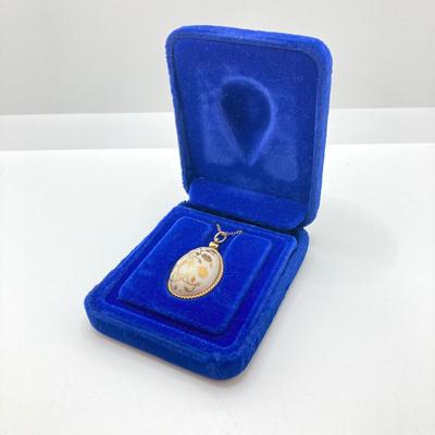 LOT 58: Vintage The Franklin Mint 1978 Easter Egg 24K Gold over Porcelain Lacy Floral Motif Pendant Necklace with Gold Filled Chain