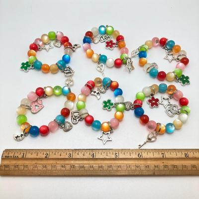 LOT 63: Large Collection of Hand Crafted Jewelry - Bracelets and Hair Jewelry