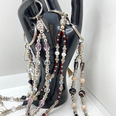 LOT 65: Collection of Hand Crafted Lanyards / Eye Glass Holders / Craft Beads