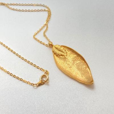 LOT 73: Collection of Vintage Gold Tone Pendant / Statement Necklaces