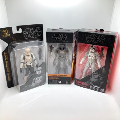 LOT 75: Collection of Three Star Wars Figurines in Original Boxes - Imperial Hovertank Drriver, New Republic Droid and At-At Driver