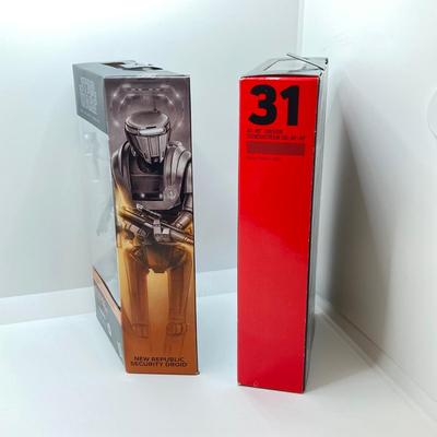 LOT 75: Collection of Three Star Wars Figurines in Original Boxes - Imperial Hovertank Drriver, New Republic Droid and At-At Driver