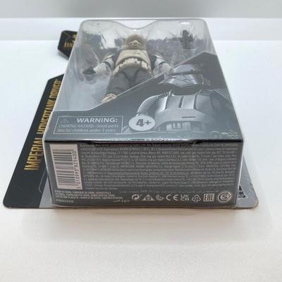 LOT 75: Collection of Three Star Wars Figurines in Original Boxes - Imperial Hovertank Drriver, New Republic Droid and At-At Driver