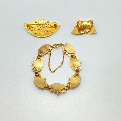 LOT 77: Beautiful Collection of Vintage Jewelry - Damascene Three Piece Set, Brooch and Gold Tone Earrings