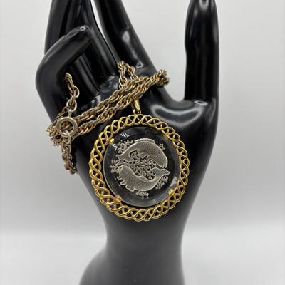 LOT 96: Vintage Pendant/Necklace Collection: Trifari Pisces Etched Glass Zodiac, Barbados Cut-out Coin, Gold/Silver Tone Pisces Zodiac...