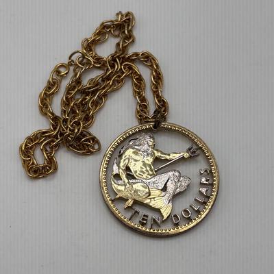 LOT 96: Vintage Pendant/Necklace Collection: Trifari Pisces Etched Glass Zodiac, Barbados Cut-out Coin, Gold/Silver Tone Pisces Zodiac...