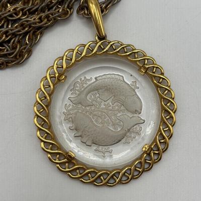 LOT 96: Vintage Pendant/Necklace Collection: Trifari Pisces Etched Glass Zodiac, Barbados Cut-out Coin, Gold/Silver Tone Pisces Zodiac...