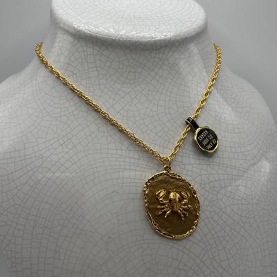LOT 96: Vintage Pendant/Necklace Collection: Trifari Pisces Etched Glass Zodiac, Barbados Cut-out Coin, Gold/Silver Tone Pisces Zodiac...
