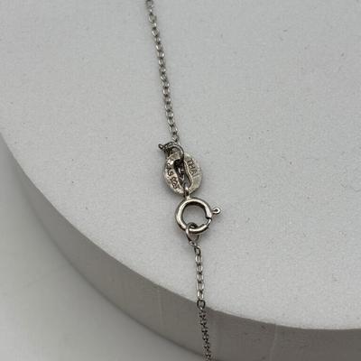 LOT 113: Sterling Silver Open Heart Angel Necklace w/Pendant and Matching Earrings