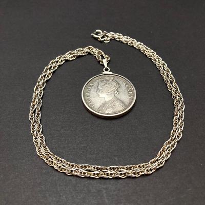 LOT 141: Vintage Pendant Necklace with British India 1862 One Rupee Silver Coin Featuring Queen Victoria