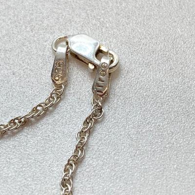 LOT 142: Sterling Silver Heart Shaped Monogrammed "Butterball" Pendant Urn Necklace and Silver Tone Pegusus Pendant with...