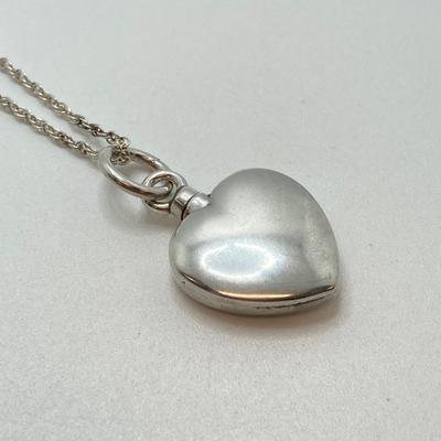 LOT 142: Sterling Silver Heart Shaped Monogrammed "Butterball" Pendant Urn Necklace and Silver Tone Pegusus Pendant with...