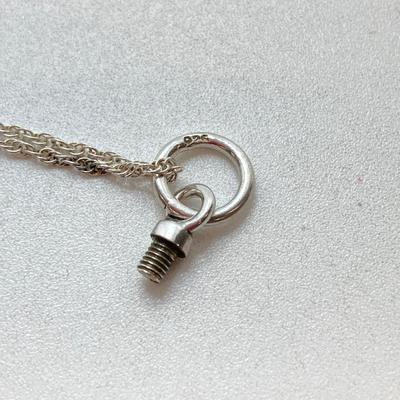 LOT 142: Sterling Silver Heart Shaped Monogrammed "Butterball" Pendant Urn Necklace and Silver Tone Pegusus Pendant with...