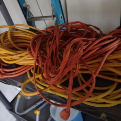 Collection of Extension Cords Various Lengths and Gauges