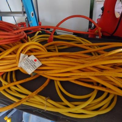 Collection of Extension Cords Various Lengths and Gauges
