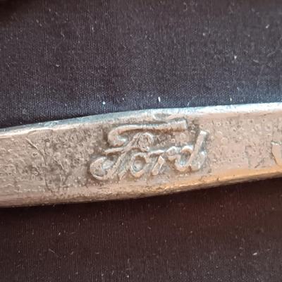 FORD COMBINATION WRENCHES, PIPE WRENCH AND A HANDLE