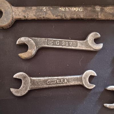 FORD COMBINATION WRENCHES, PIPE WRENCH AND A HANDLE