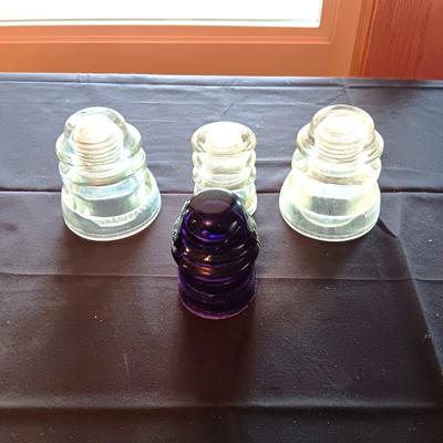 1 PURPLE AND 3 CLEAR INSULATORS