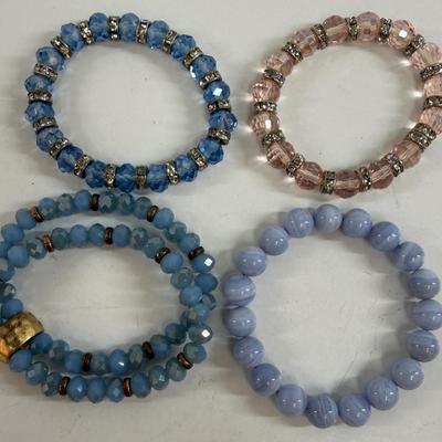 Sale Photo Thumbnail #32: 4 stretch-style bracelets, all in good condition.