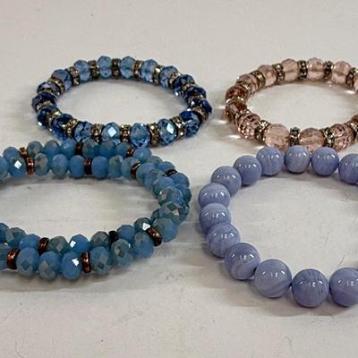 Sale Photo Thumbnail #31: 4 stretch-style bracelets, all in good condition.