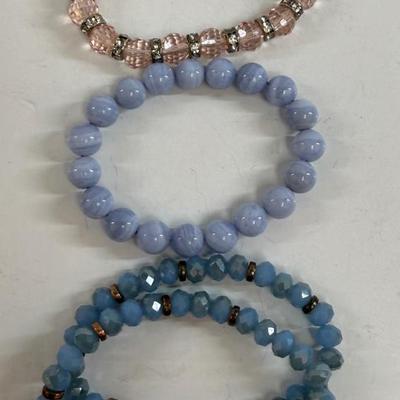 Sale Photo Thumbnail #30: 4 stretch-style bracelets, all in good condition.