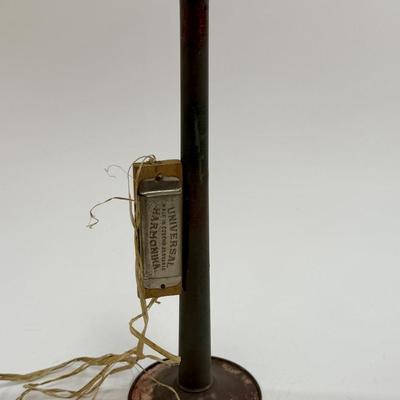 Sale Photo Thumbnail #53: Horn has surface rust. Nice display piece. Harmonica looks to be glued to the horn.