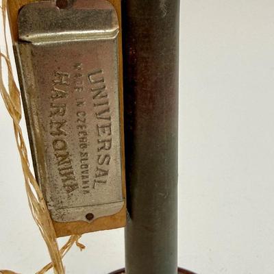 Sale Photo Thumbnail #51: Horn has surface rust. Nice display piece. Harmonica looks to be glued to the horn.