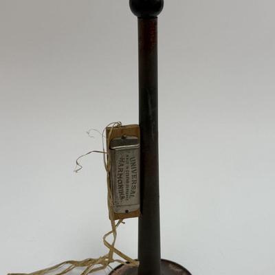 Sale Photo Thumbnail #52: Horn has surface rust. Nice display piece. Harmonica looks to be glued to the horn.