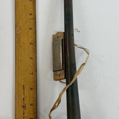 Sale Photo Thumbnail #46: Horn has surface rust. Nice display piece. Harmonica looks to be glued to the horn.