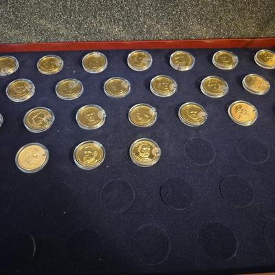 Sale Photo Thumbnail #9: This lot is for 24 uncirculated 24kt gold plated Coins with case if you want to complete the set.