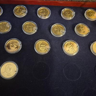 Sale Photo Thumbnail #13: This lot is for 24 uncirculated 24kt gold plated Coins with case if you want to complete the set.