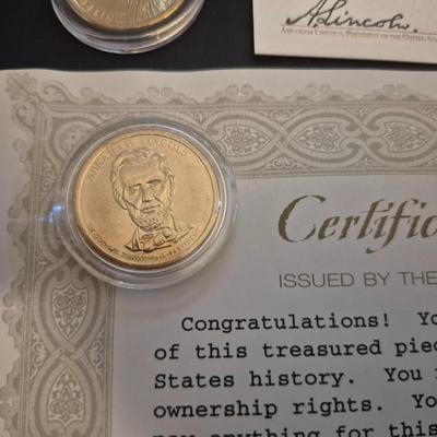 Sale Photo Thumbnail #21: This lot is for 4 uncirculated 24kt gold plated presidential coins. 2 Coins come with a certificate of authenticity, The other 2 Are sealed w/o a COA