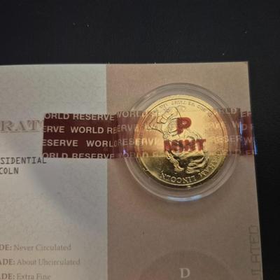 Sale Photo Thumbnail #18: This lot is for 4 uncirculated 24kt gold plated presidential coins. 2 Coins come with a certificate of authenticity, The other 2 Are sealed w/o a COA