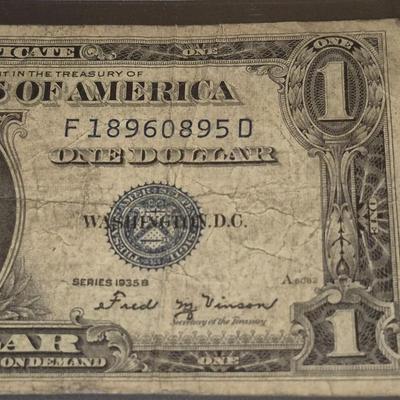 Sale Photo Thumbnail #25: 1935B $1 Silver Certificate Error no "IN GOD WE TRUST" on back. this bill is in fair condition but please make sure you look at all the photos
