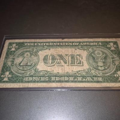 Sale Photo Thumbnail #27: 1935B $1 Silver Certificate Error no "IN GOD WE TRUST" on back. this bill is in fair condition but please make sure you look at all the photos