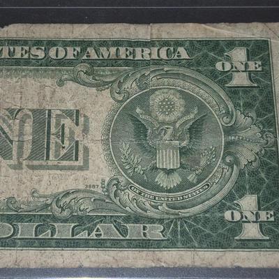 Sale Photo Thumbnail #28: 1935B $1 Silver Certificate Error no "IN GOD WE TRUST" on back. this bill is in fair condition but please make sure you look at all the photos