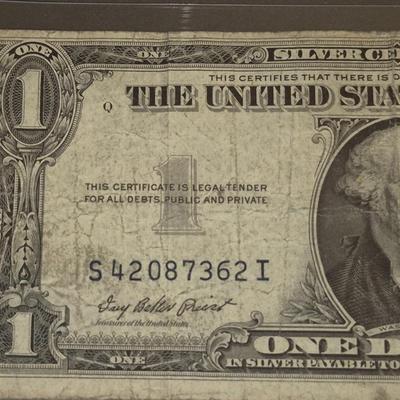 Sale Photo Thumbnail #33: 1935F $1 Silver Certificate ERROR   no "IN GOD WE TRUST" on back this bill is in fair condition