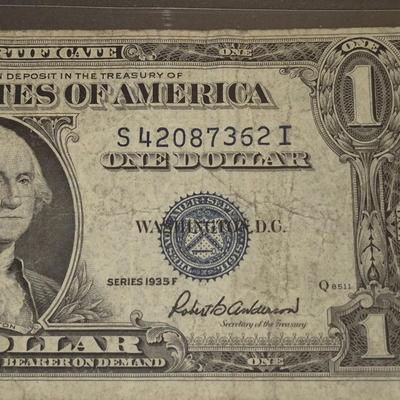 Sale Photo Thumbnail #32: 1935F $1 Silver Certificate ERROR   no "IN GOD WE TRUST" on back this bill is in fair condition