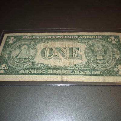 Sale Photo Thumbnail #36: 1935F $1 Silver Certificate ERROR   no "IN GOD WE TRUST" on back this bill is in fair condition