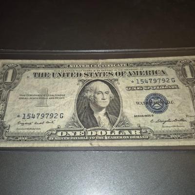 Sale Photo Thumbnail #37: 1935G $1 Silver Certificate STAR NOTE. no "IN GOD WE TRUST" on Back. This bill is in fair condition
