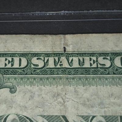 Sale Photo Thumbnail #44: 1935G $1 Silver Certificate STAR NOTE. no "IN GOD WE TRUST" on Back. This bill is in fair condition