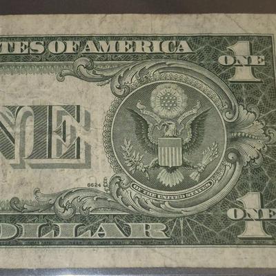 Sale Photo Thumbnail #42: 1935G $1 Silver Certificate STAR NOTE. no "IN GOD WE TRUST" on Back. This bill is in fair condition