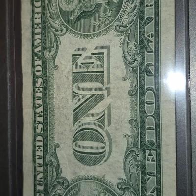 Sale Photo Thumbnail #292: This is for a 1935 E $1 Silver Certificate without the Motto "in God We Trust", Please look at all photos for condition